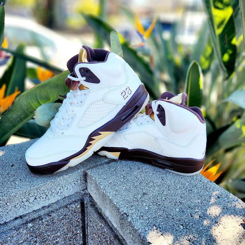 gold and white jordan 5