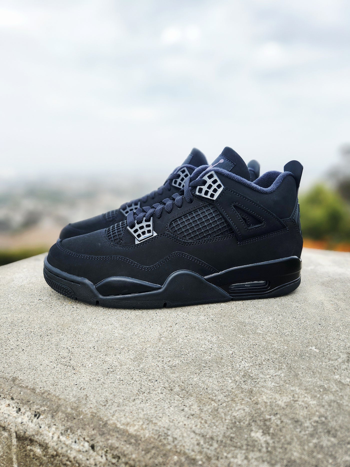 Air Jordan 4 Retro “Black Cat”